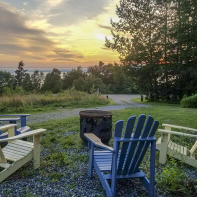 A view of the sunset as seen from the firepit on the front lawn